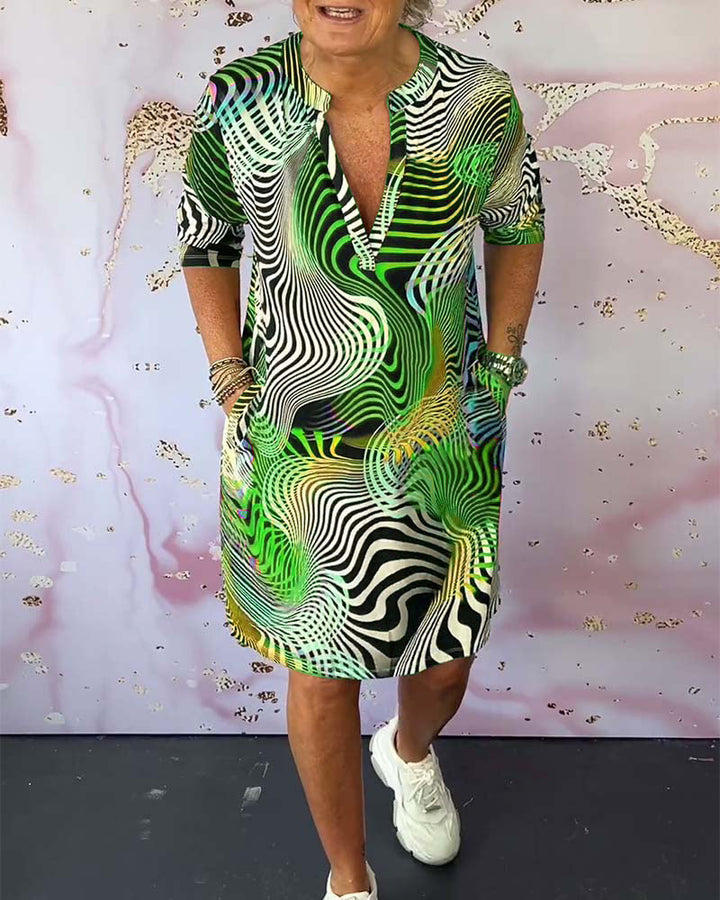 Ria™ | Kleurrijke V-hals jurk