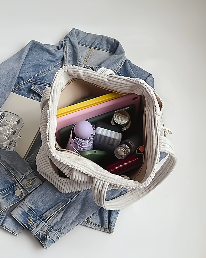 Hilda | Geribbelde tas met trekkoorddetail